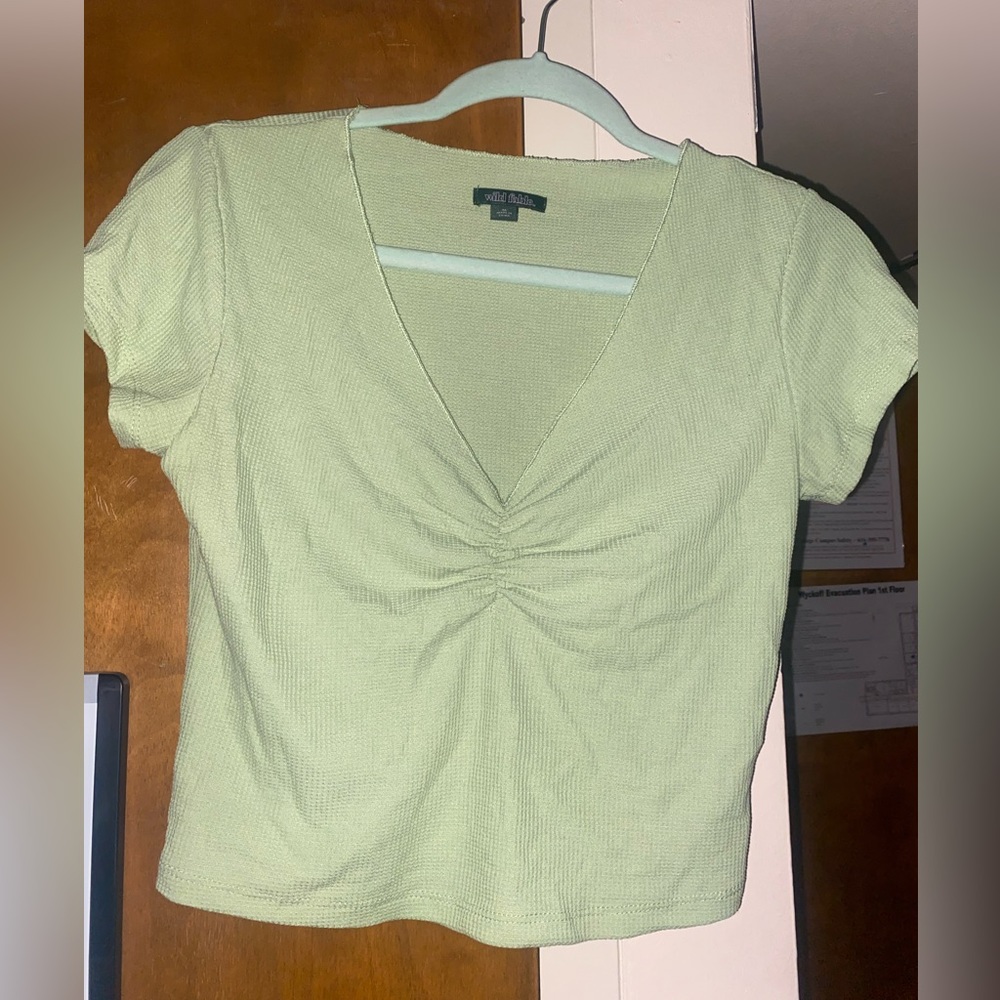 Mint green cropped shirt size medium. Brand is wild fable.
